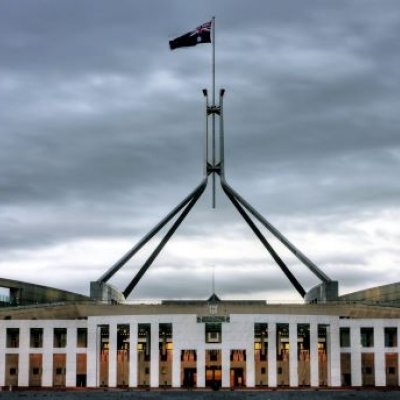 Parliament House, Canberra under a cloudy sky. Adobe